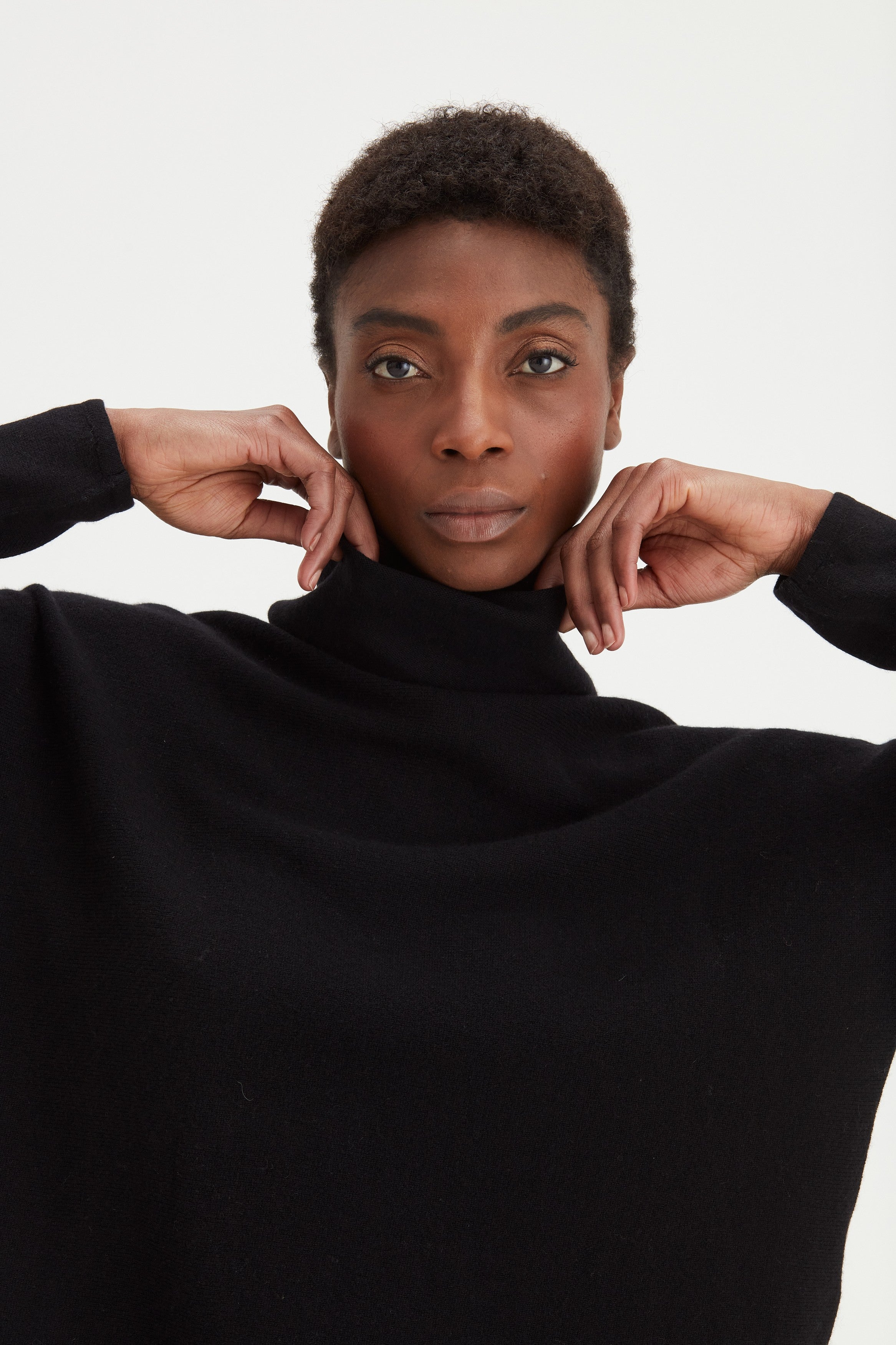Curved_Turtleneck-Sweaters-